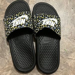 Women size 7 Nike slides